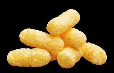 Delicious sweet corn sticks, isolated on black background