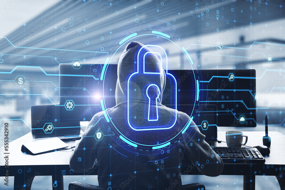 Poster Back view of hacker using laptop computer at desktop with glowing circuit padlock sign on blurry office interior background. Safety, secure, hacking and online prtection concept. Double exposure.