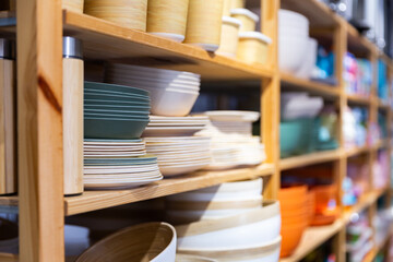 Store selling pastel color bowls, dishes, cups on tableware shop
