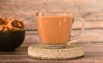 A Cup of Tea in a glass Tumbler. It is also called Chai in In