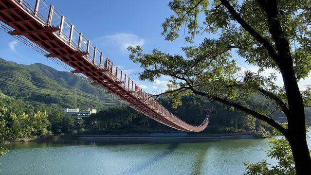  People passing through Majang Lake Rock Bridge in Paju, Gyeonggi-do, Republic of Korea