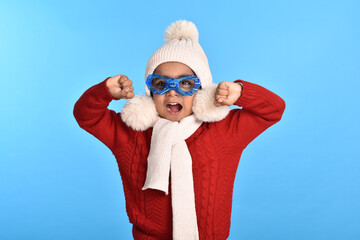 Fototapeta premium child wearing glasses and winter clothes