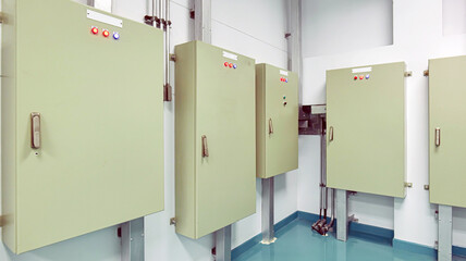 The power control room inside the building has a sizable power distribution control cabinet...