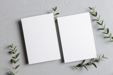 Invitation card mockup with eucalyptus twigs, front and back sides, blank card with copy space