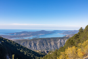 Scenic view of bay of Kotor and Tivat region seen from Derinski Vrh, Adriatic Mediterranean Sea, Montenegro, Balkan Peninsula, Europe. Fjord winding along coastal towns. Lovcen, Orjen national park