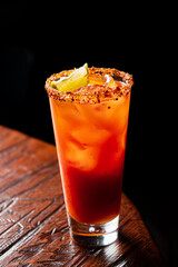tasty cocktail on the wooden background