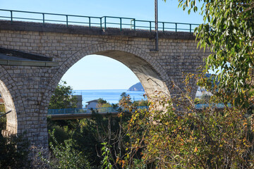 Arch of the railway bridge on a summer day, Montenegro.