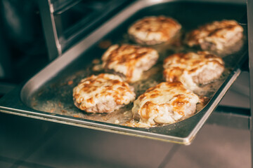 meat in the oven in the kitchen in the restaurant