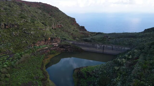 Aerial view of mountain lake Embalse de Agulo on La Gomera island. Beauty of Canary Islands, Spain