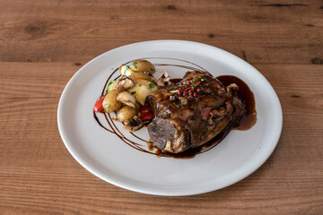 Cordero con salsa de miel y romero