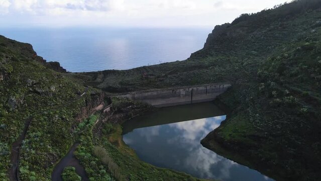 Aerial view of mountain lake Embalse de Agulo on La Gomera island. Beauty of Canary Islands, Spain