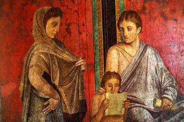 Ancient Roman fresco in Pompeii showing a detail of the mystery cult of Dionysus. Pompeii destroyed by the eruption of Vesuvius in 79 BC - 555365310