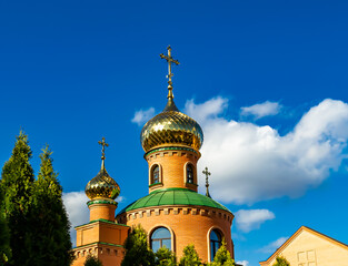 Christian church cross in high steeple tower for prayer