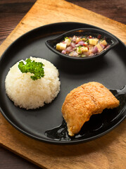 fried fish wiht rice and dipping sauce