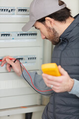 electrician installing energy saving meter