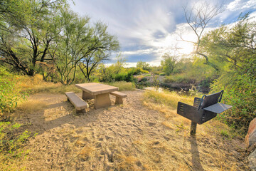 Sabino Canyon State Park, Tucson, Arizona- camping area with wood grill and view of a creek