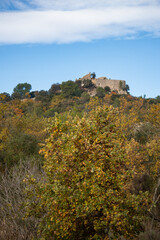 Ruins of the castle of Castellas, over Rocbaron and Forcalquieret in Provence, France, under a nice cloudy sky in winter
