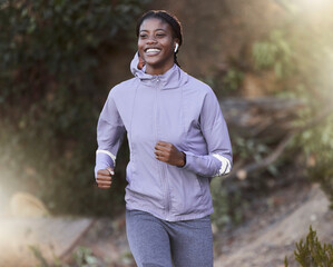 Black woman, running and outdoor for exercise, training or fitness for health, wellness or smile. Jamaican female, healthy athlete or runner in nature, workout or practice for power, energy or cardio