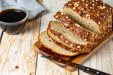 sliced wholemeal bread with cereal with coffee