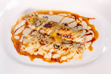 baked cannelloni with cheese and truffles
