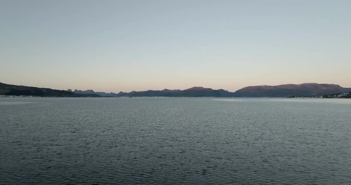 Flying Over Fjord At Polar Night In The Town Of Sortland, Nordland County, Norway. wide aerial