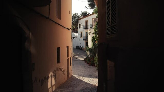 Moving through an alley in the old town of Ibiza, Dalt Vila
