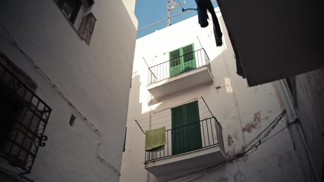 The white building in the narrow street of Ibiza old town, Dalt Vila