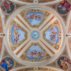 IVREA, ITALY - JULY 15, 2022: The frescoes with the Four Evangelists in cupola of church Chiesa di San Salvatore by Giovanni Silvestro (1914).
