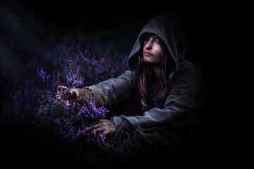 Poor girl is looking for herbs in the bog