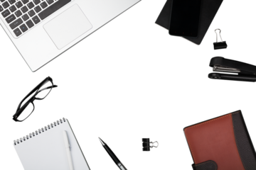 Office workspace with notebook, pen, coffee, clips and accessories.