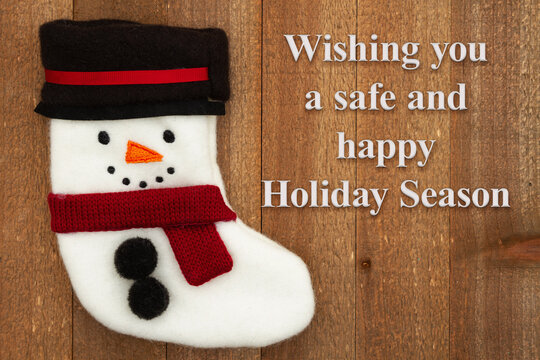 Wishing you a safe and happy Holiday Season with a snowman stocking