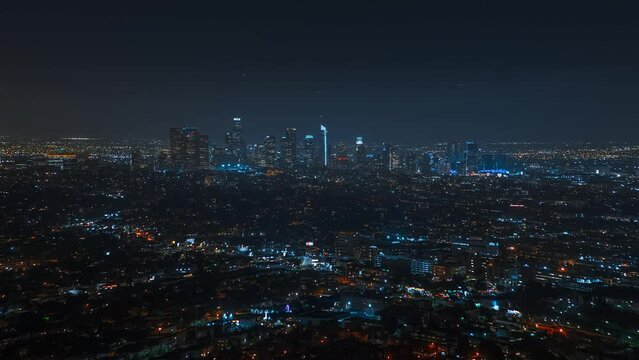 Los Angeles downtown timelapse at night. Big american city. Skyscrapers and street lights with traffic