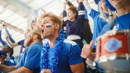 Sport Stadium Event: Crowd of Fans Cheer for their Blue Soccer Team to Win. People Celebrate...