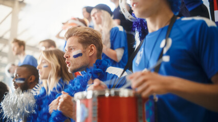 Sport Stadium Big Event: Handsome Happy Caucasian Man Emotionally Cheers, Screams. Crowd of Fans...