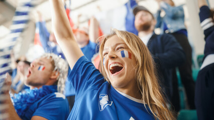 Sport Stadium Big Event: Portrait of Beautiful Sports Fan Girl with French Flag Painted Face Cheering For Her Team to Win. Crowd of Fans Shout, Celebrate Scoring a Goal, Championship Victory - obrazy, fototapety, plakaty