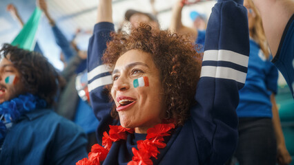 Sport Stadium Soccer Match: Portrait of Beautiful Bi Racial Fan Girl with Italian Flag Painted Face...