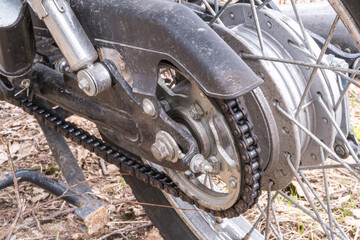 motorcycle rear wheel and exhaust pipe