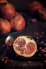 Pomegranates on a wood table