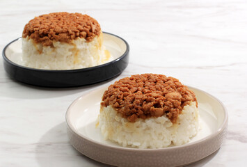 Steamed Chicken Rice, Minced Sweet Chicken Topping Above Steamed Rice. Indonesian Dish with Chinese Influence