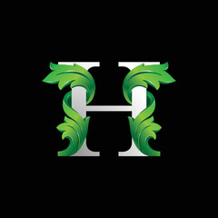Initial letter H, 3D luxury green leaf overlapping white serif font on black background