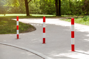 No entry for Cars or Auto. Traffic poles Bollards on Park, Entrance to Walking Area for Pedestrians...