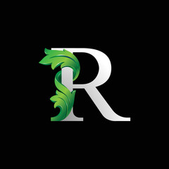 Initial letter R, 3D luxury green leaf overlapping white serif font on black background
