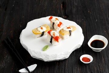 Tamako Sushi or Egg Roll and Crabstick Roll Sushi