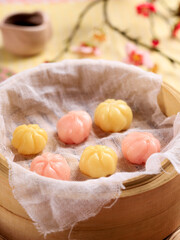 Kkultteok is Ball Shaped Rice Cake Filled with Honey and Sesame Syrup