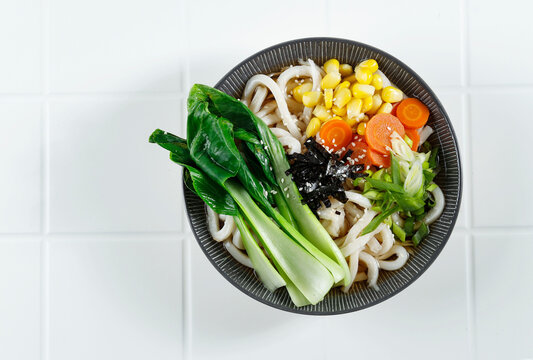 Udon with Vegetable, Concept Healthy Udon. On White Table