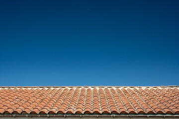 Tile Roof and Bright Blue Sky