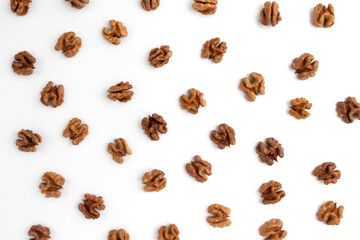 heap of walnuts isolated on white background