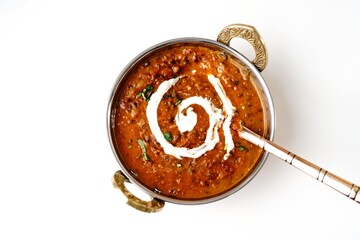 Dal Makhani - Indian black lentil curry isolated on white, selective focus