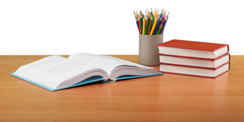 Stack school books with colorful pencils on a desk