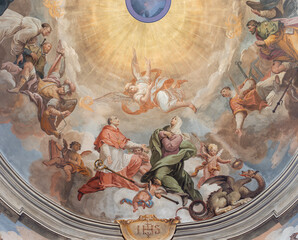 DOMODOSSOLA, ITALY - JULY 19, 2022: The baroque fresco of Apotheosis of St. Charkes Borromeo in...